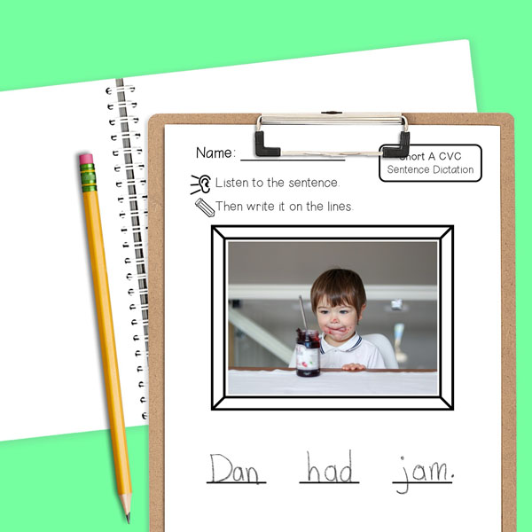 Printed short A CVC sentence dictation page of boy with jam on face and sentence Dan had jam.