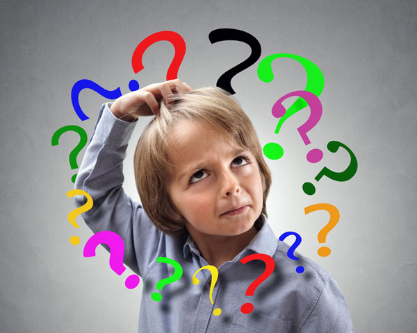 A boy is very confused as he scratches his head and question marks surround him.